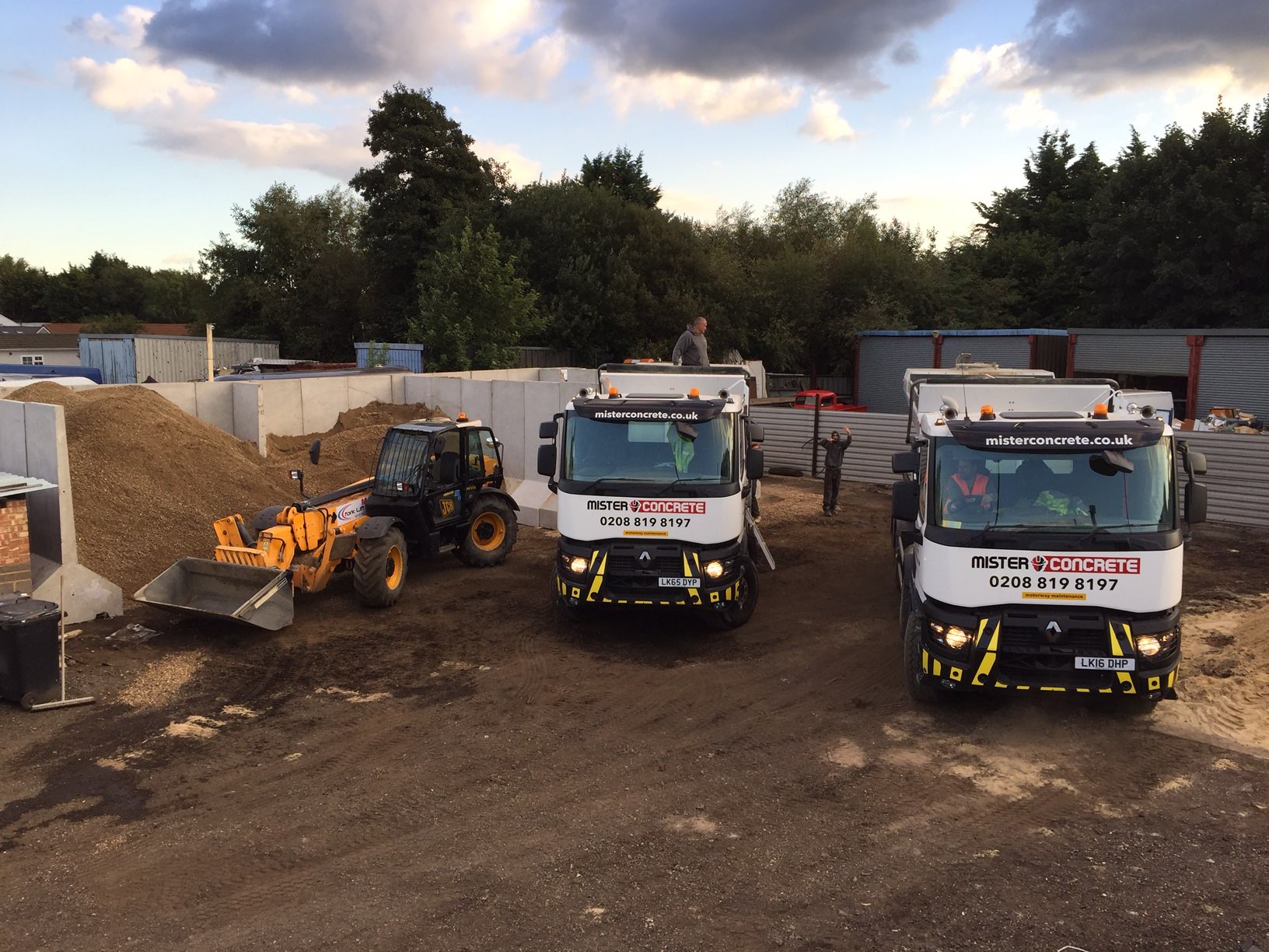 mister concrete trucks in a depot Surrey, two concrete trucks